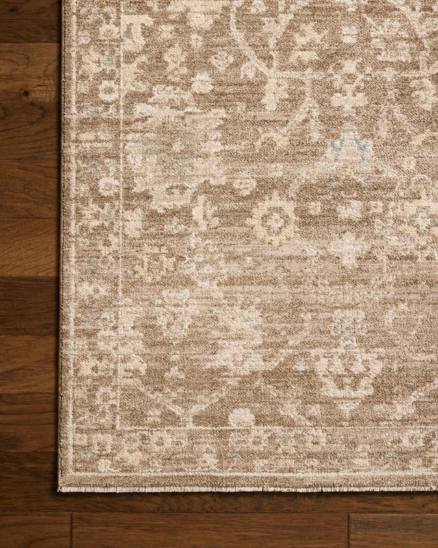 Chris Loves Julia x Loloi Palma PLM-09 Brown / Earth Rug - corner on wood