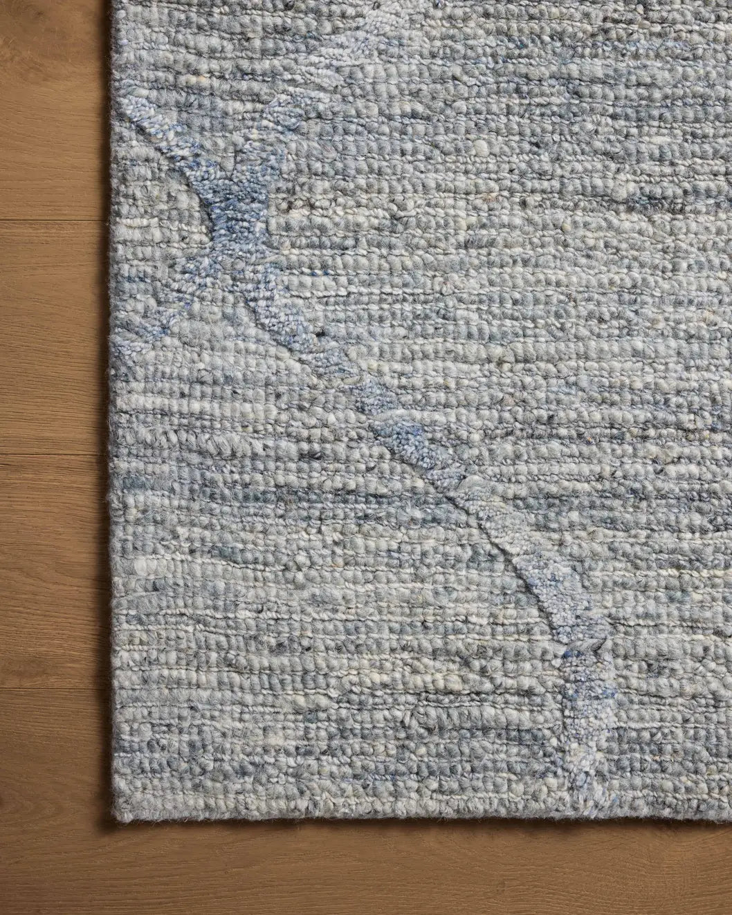 Loloi Cline Cli-01 Sky Rug - corner on wood