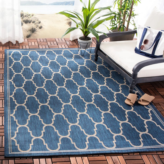 Safavieh Courtyard 5'-3" x 7'-7" Rug in Navy / Beige