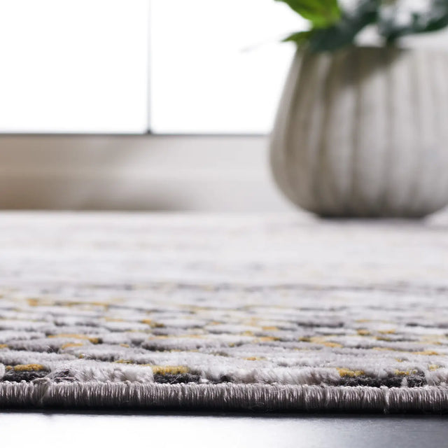Safavieh Amelia 4'-5" x 6'-5" Rug in Grey / Gold