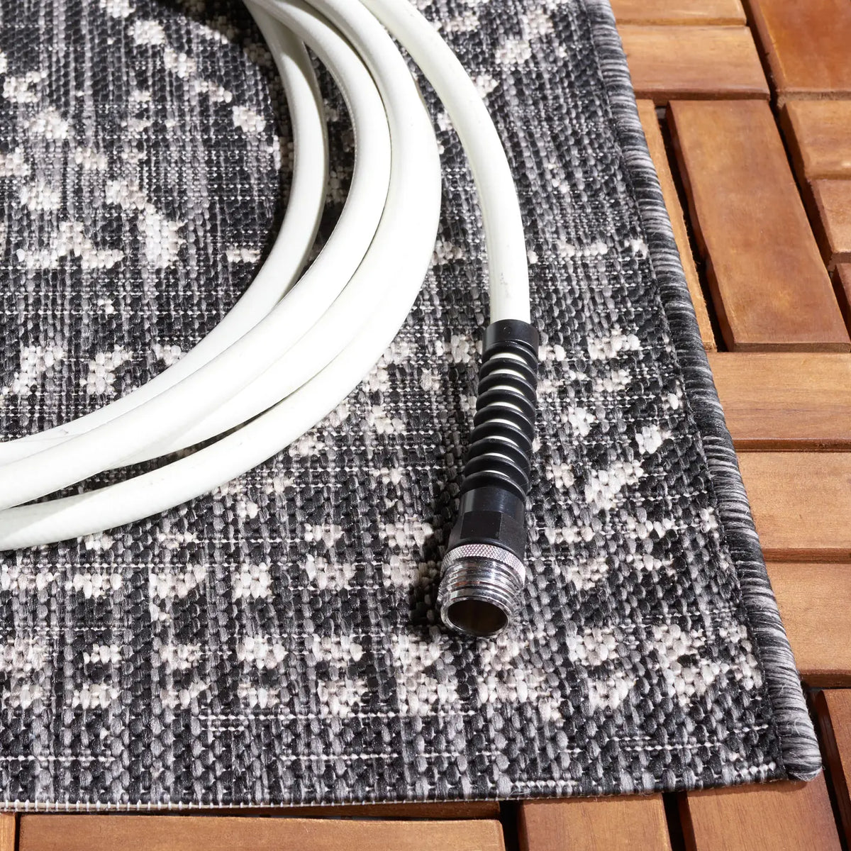Safavieh Courtyard 5'-3" x 7'-7" Rug in Black / Beige