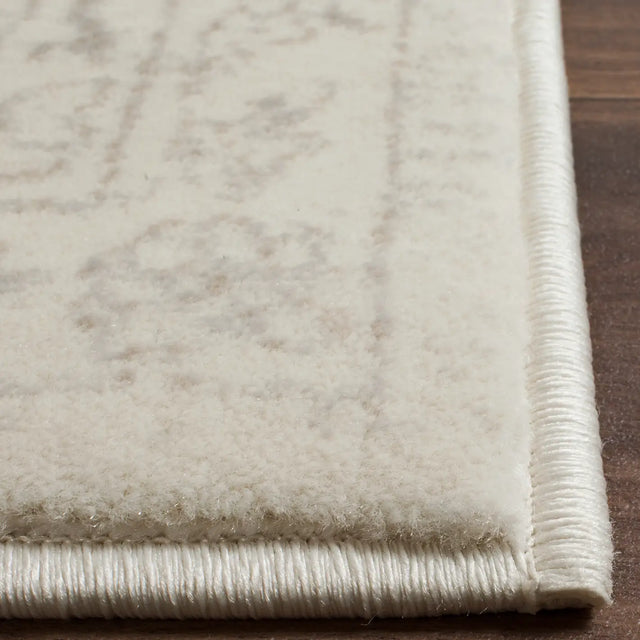 Safavieh Carnegie 6'-7" x 9'-2" Rug in Cream / Light Grey