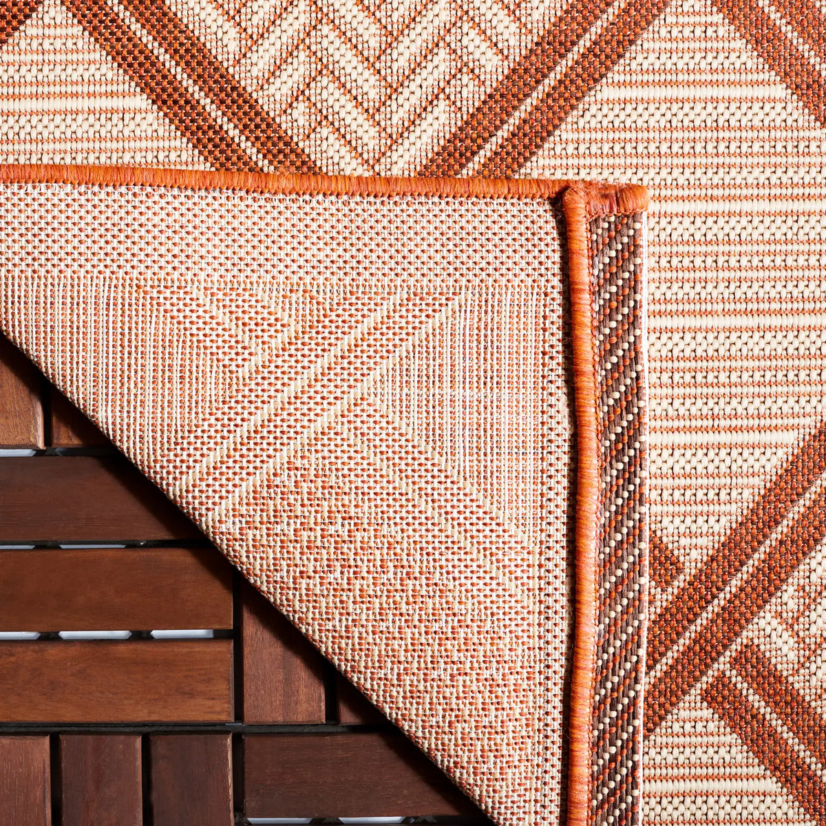 Safavieh Courtyard 5'-3" x 7'-7" Rug in Cream / Terracotta