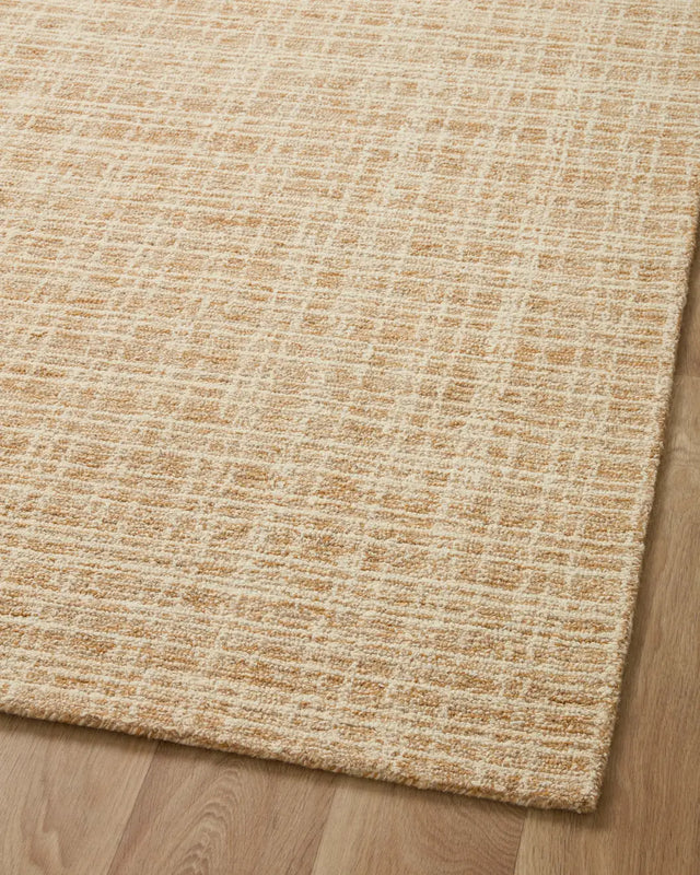 Chris Loves Julia x Loloi Polly POL-03 Straw / Ivory Rug - angled corner on wood