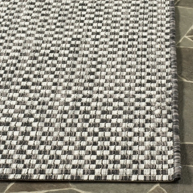 Safavieh Courtyard 5'-3" x 7'-7" Rug in Black / Light Grey