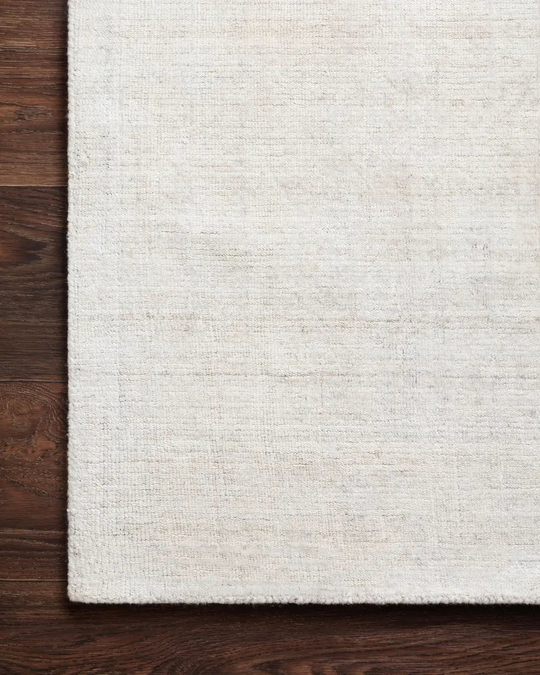 Loloi Pasadena Pas-01 Bone Rug - corner on wood