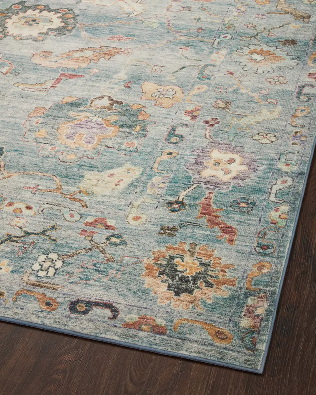 Loloi Margot Mat-06 Denim/Multi Rug - angled corner on wood