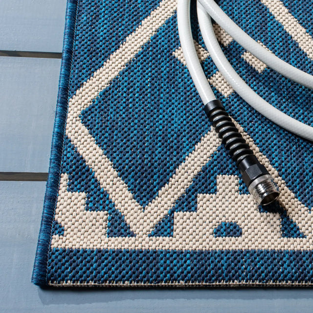 Safavieh Courtyard 6'-7" x 9'-6" Rug in Navy / Light Beige