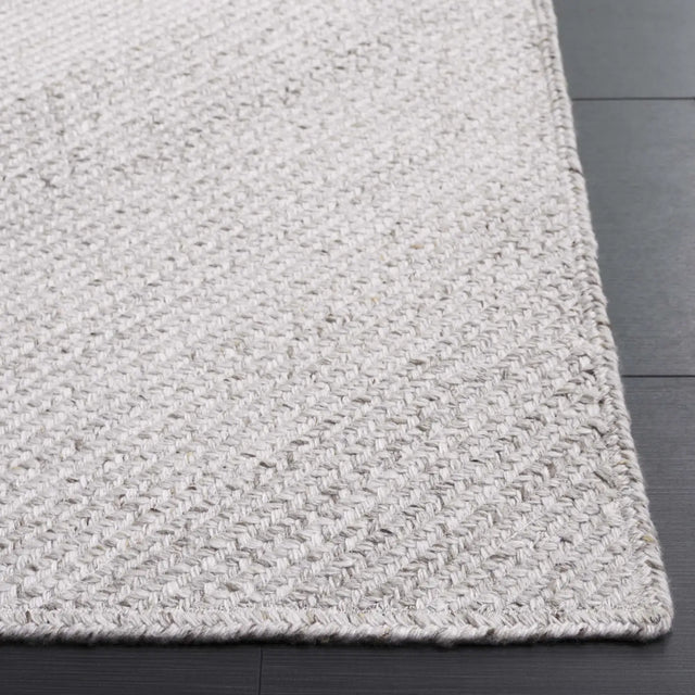 Safavieh Braided 4'-0" x 6'-0" Rug in Beige