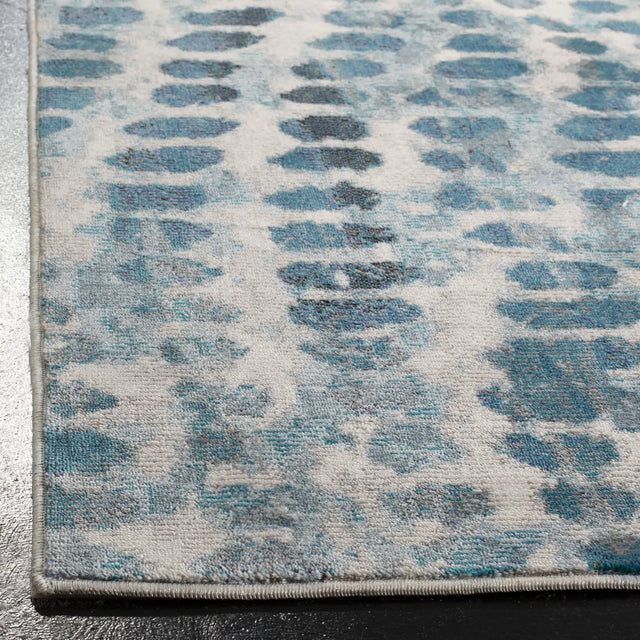 Safavieh Aria 4'-0" x 6'-0" Rug in Cream / Teal