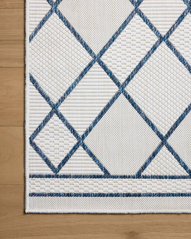 Loloi Easton ESN-08 Ivory / Denim Rug - corner on wood