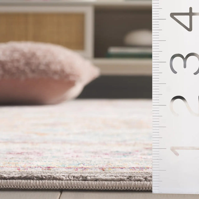 Safavieh Aria 5'-0" x 6'-7" Rug in Cream / Multi