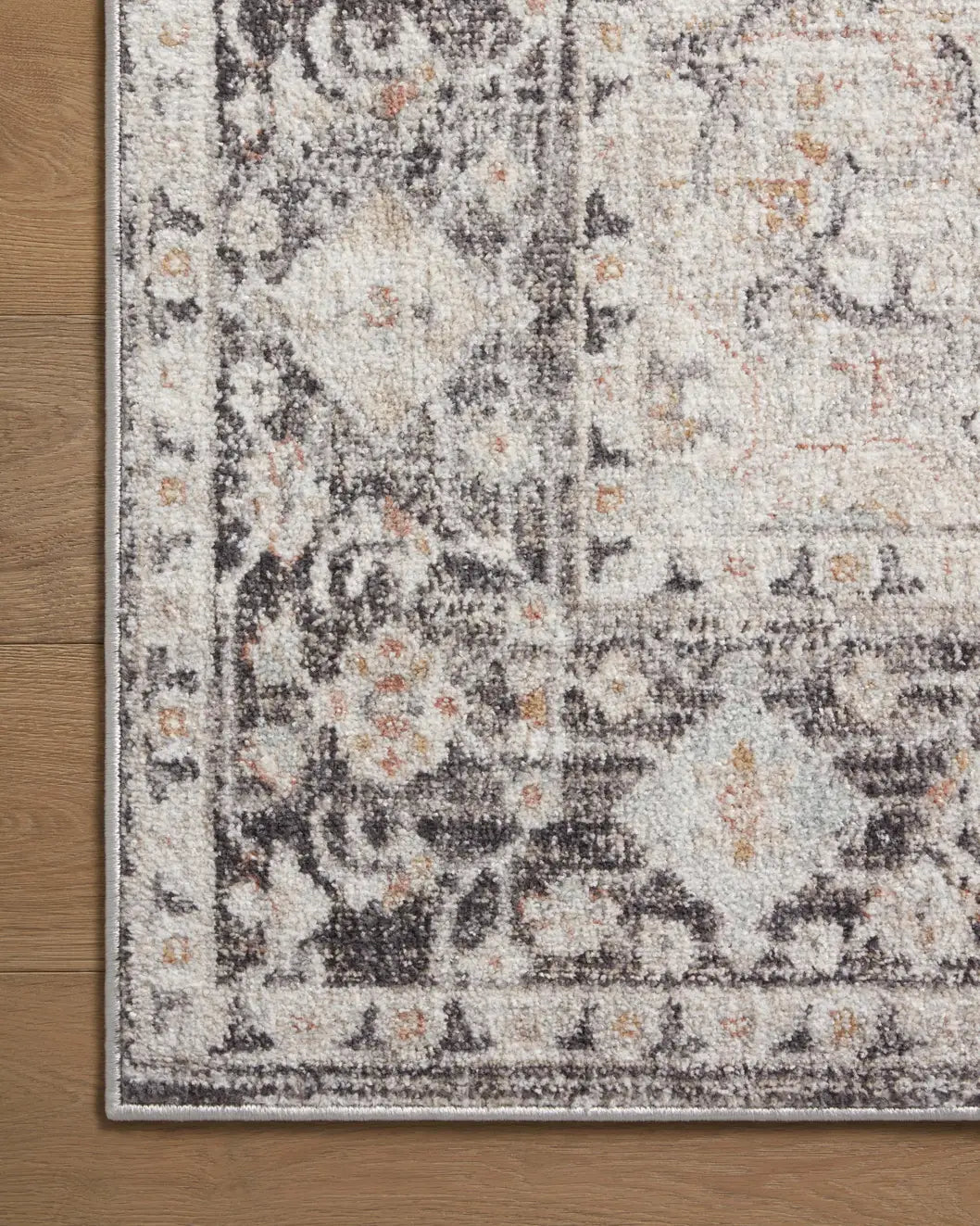 Loloi Monroe Mon-01 Charcoal/Multi Rug - corner on wood