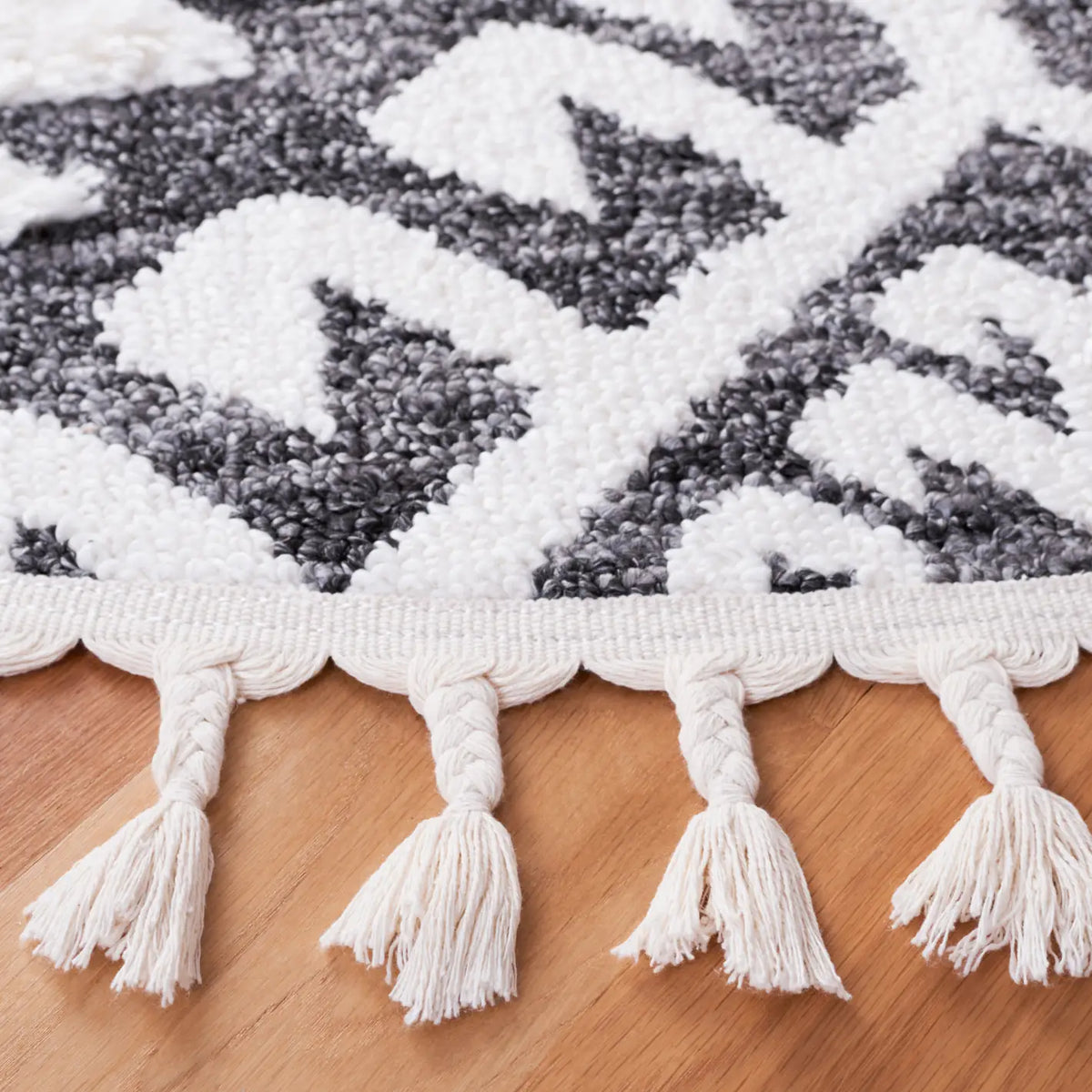 Safavieh Moroccan Tassel Shag 6'-7" x 6'-7" Rug in Dark Grey / Ivory