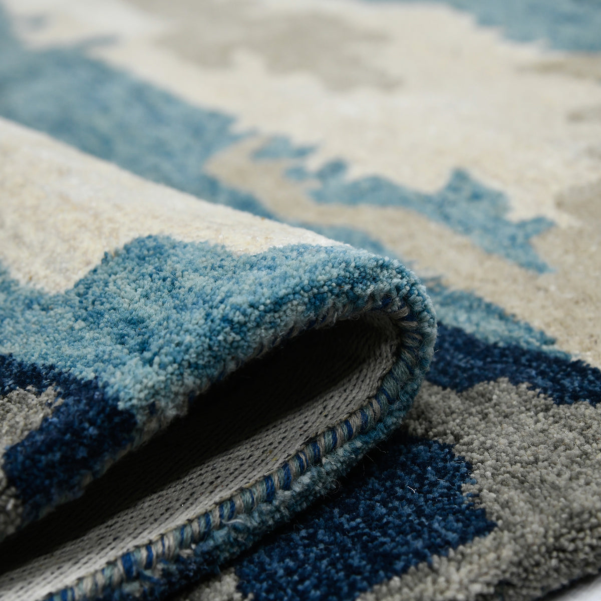 Amer Abstract ABS-4 Blue area rug - rolled view