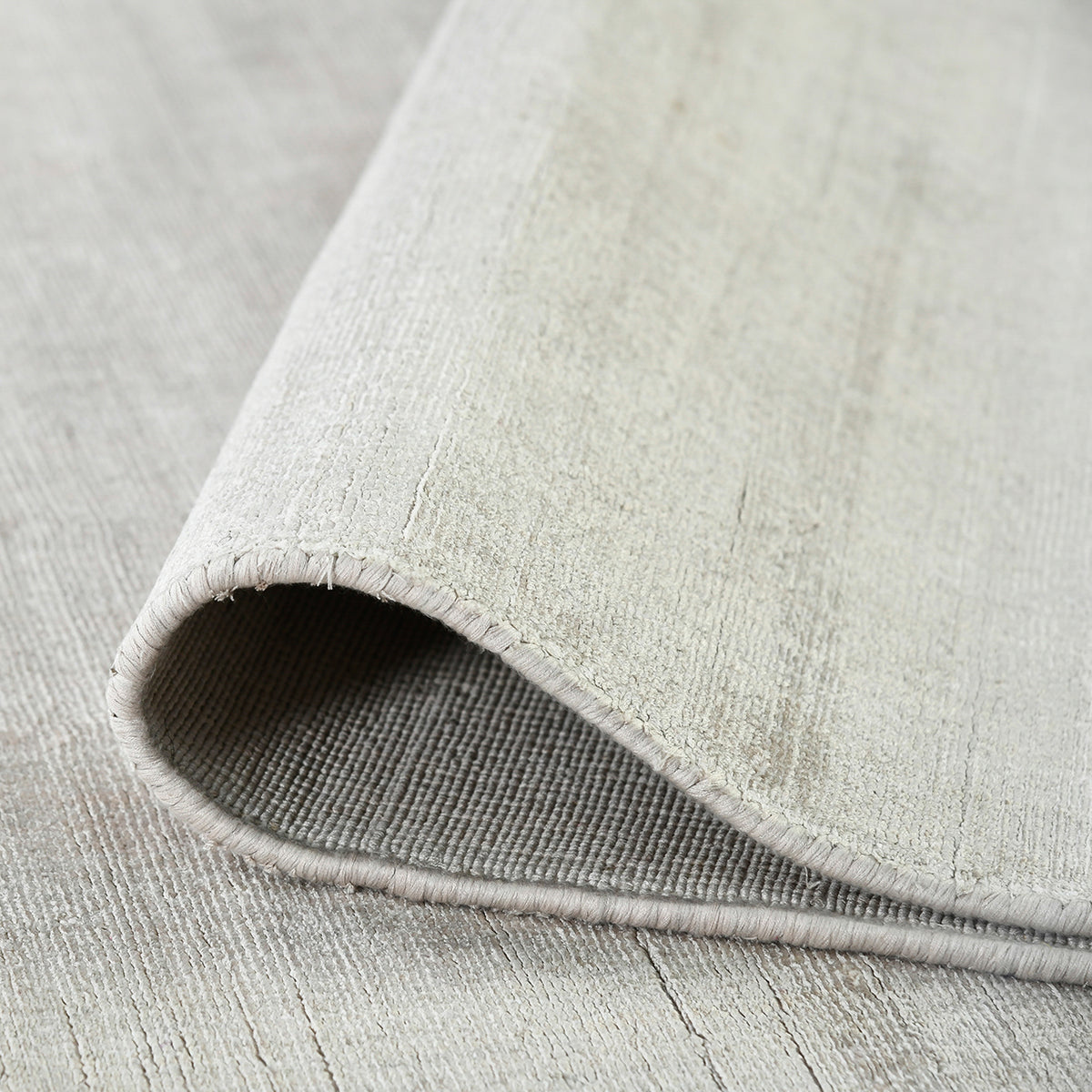 Amer Affinity AFN-3 Ivory area rug - rolled view