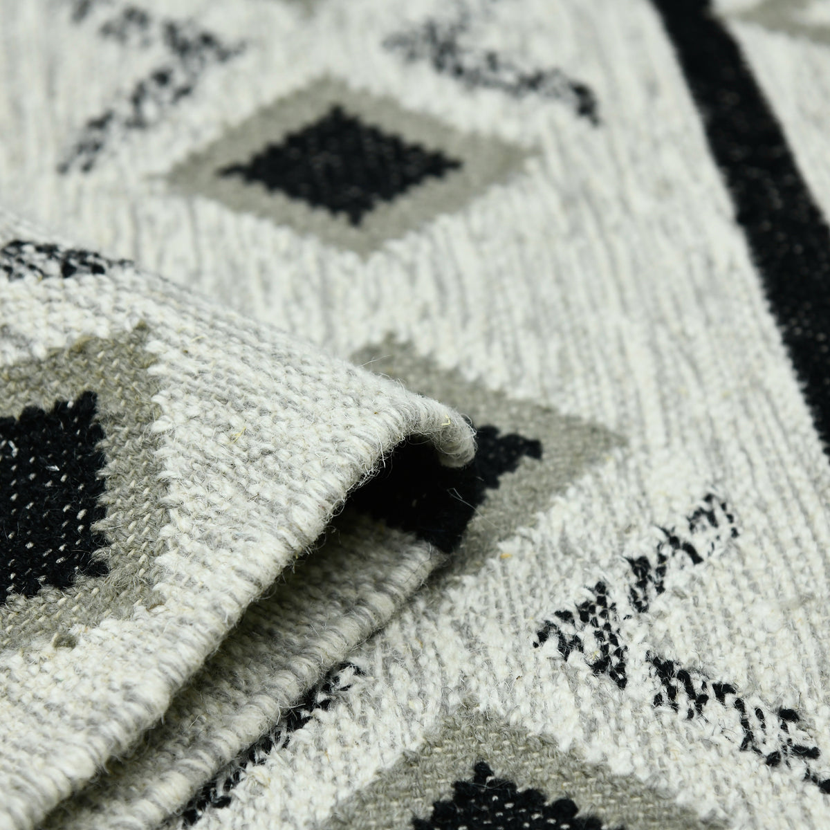 Amer Artifacts ARI-4 Ivory area rug - rolled view