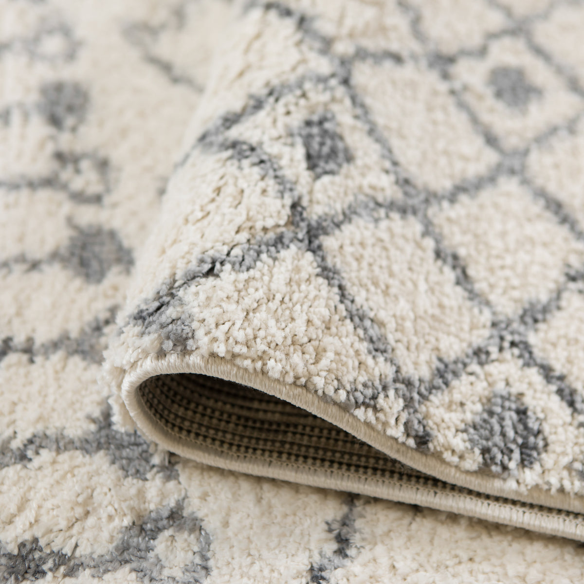 Amer Aspen ASP-1 Ivory area rug - rolled view