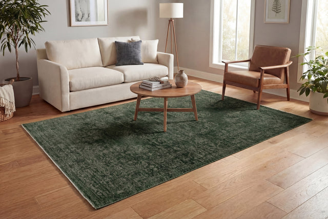 Dark green traditional power-loomed rug with distressed pattern, rectangle.