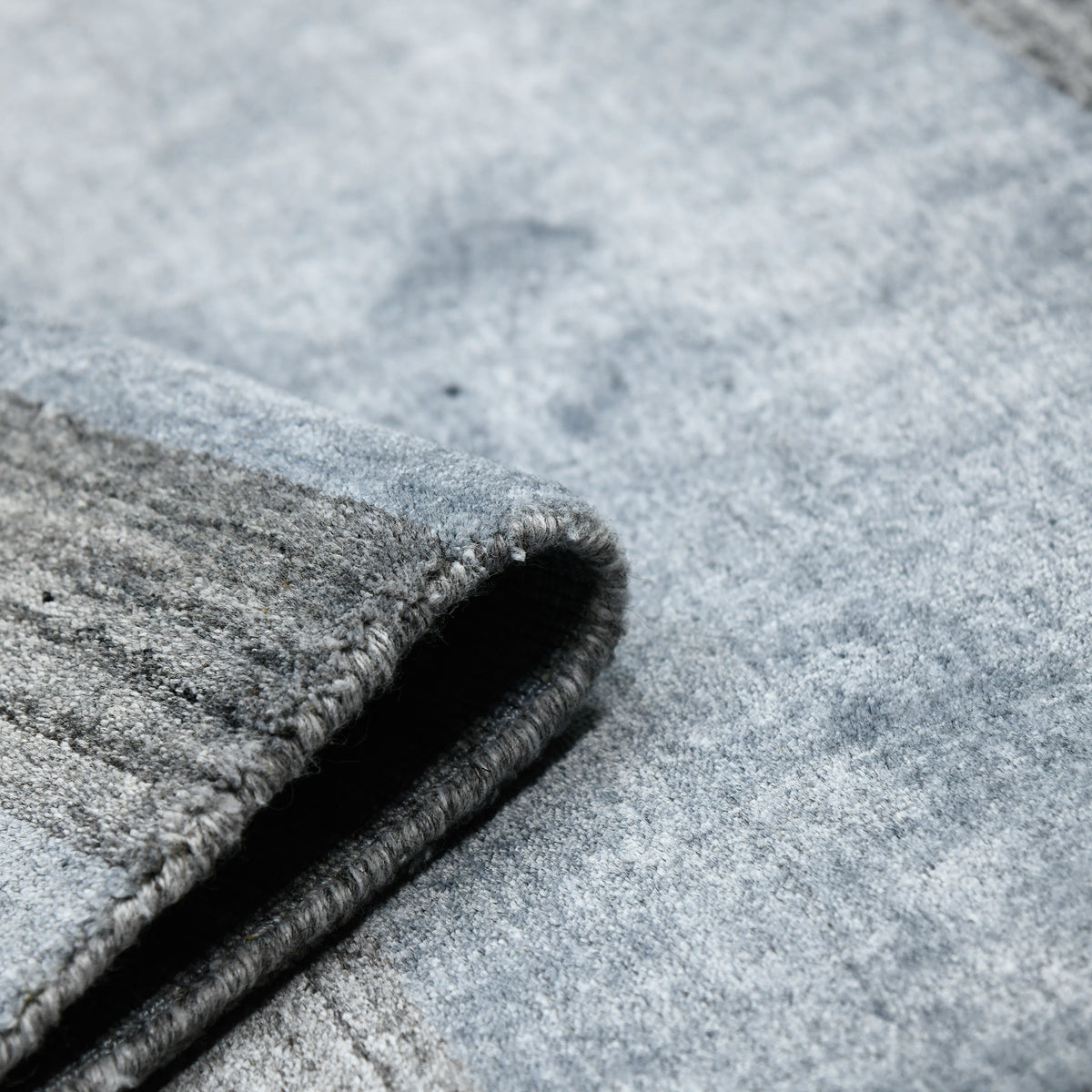 Amer Blend BLN-18 Gray area rug - rolled view