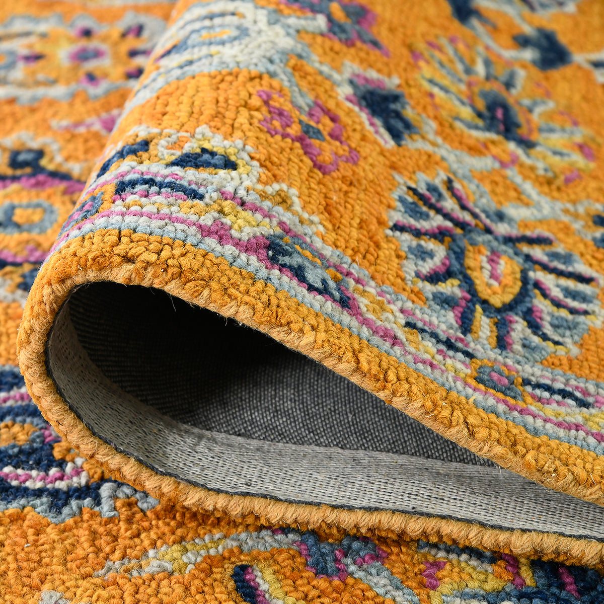 Amer Boho BOH-1 Orange area rug - rolled view