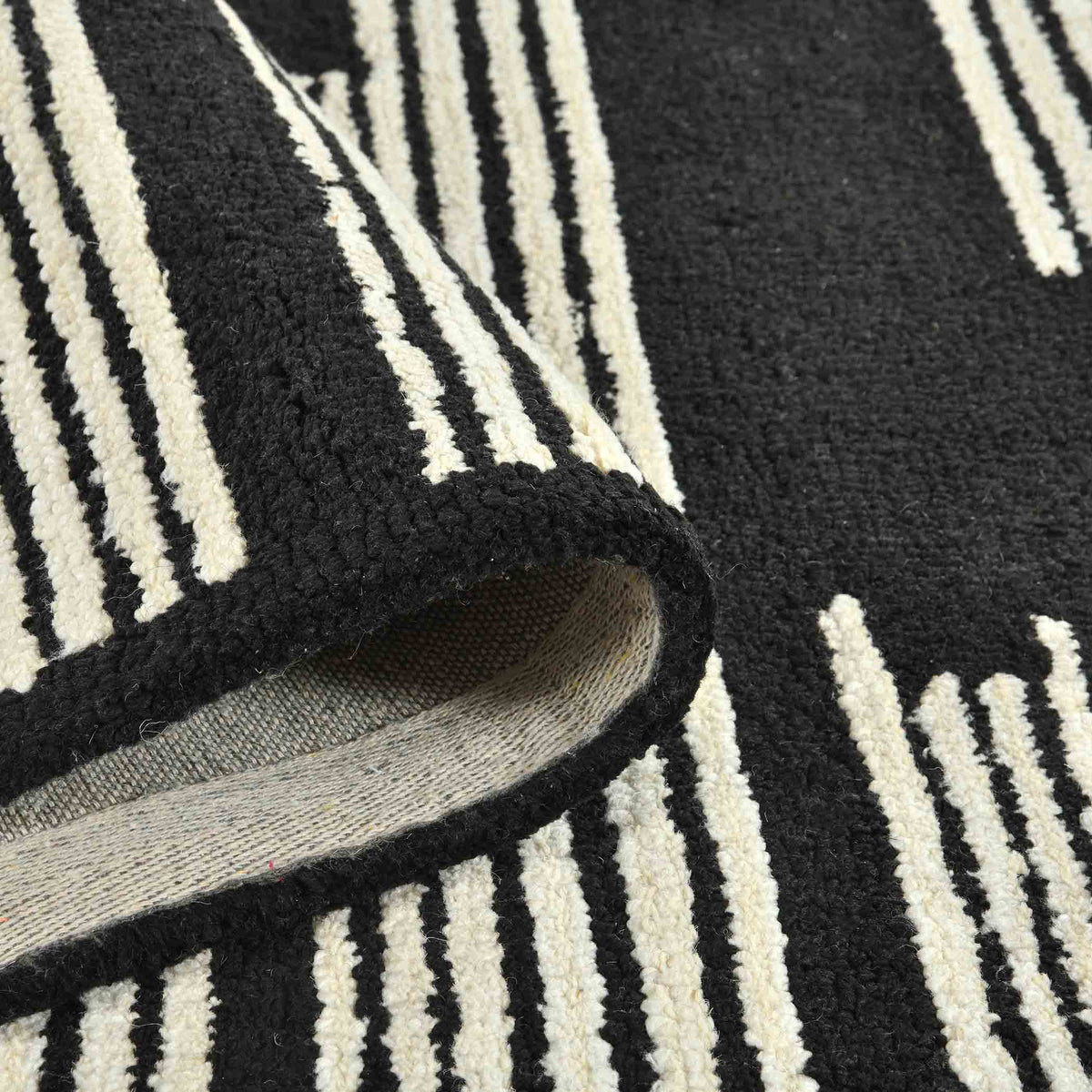 Amer Chicago CHI-6 Ebony area rug - rolled view