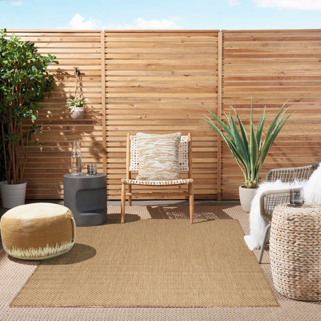 Tan jute rug with diamond weave pattern for outdoor use