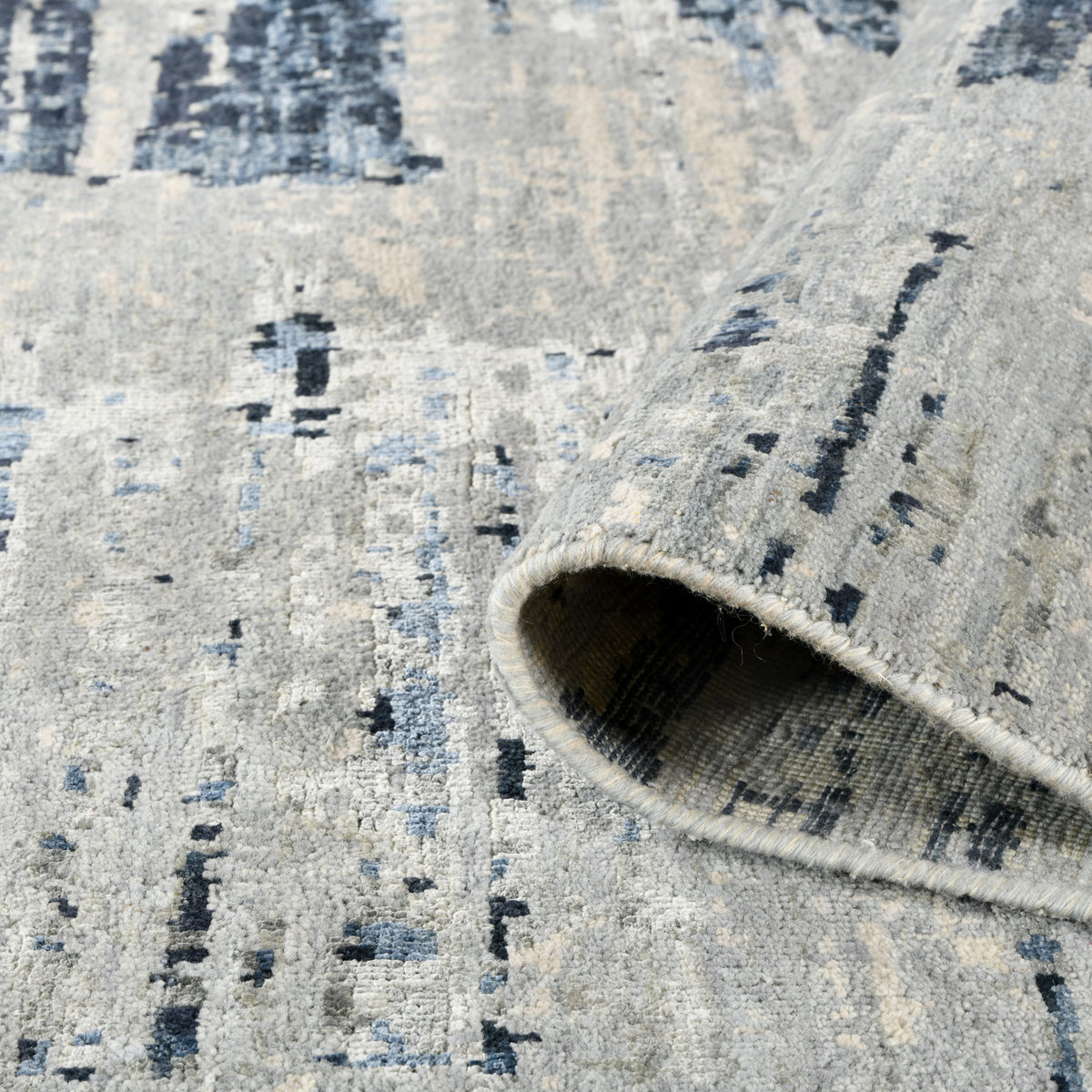 Amer Ensemble ENS-3 Spindle area rug - rolled view