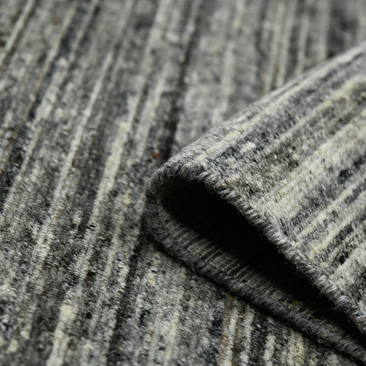 Amer Heaven HEA-5 Iron area rug - rolled view