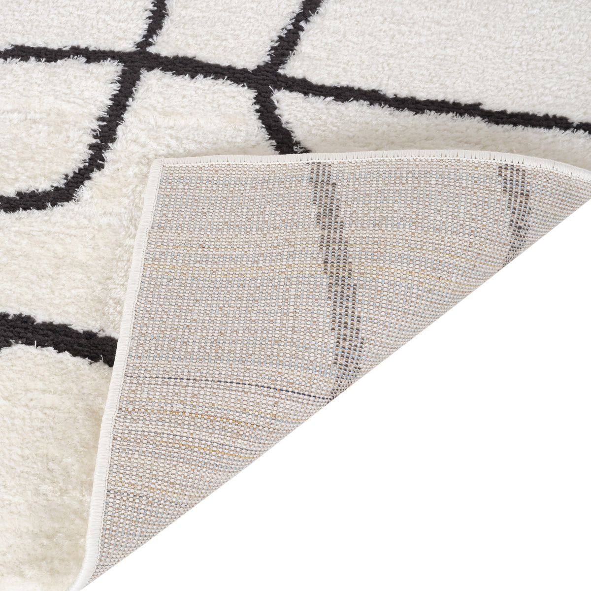 Ivory power-loom area rug with geometric Moroccan lattice lines and serged edge