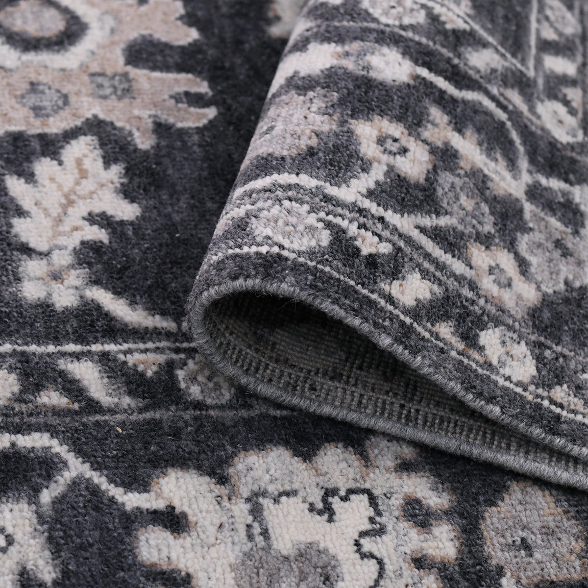 Amer Marlow 2026-03-06 00:00:00 Dark Gray area rug - rolled view