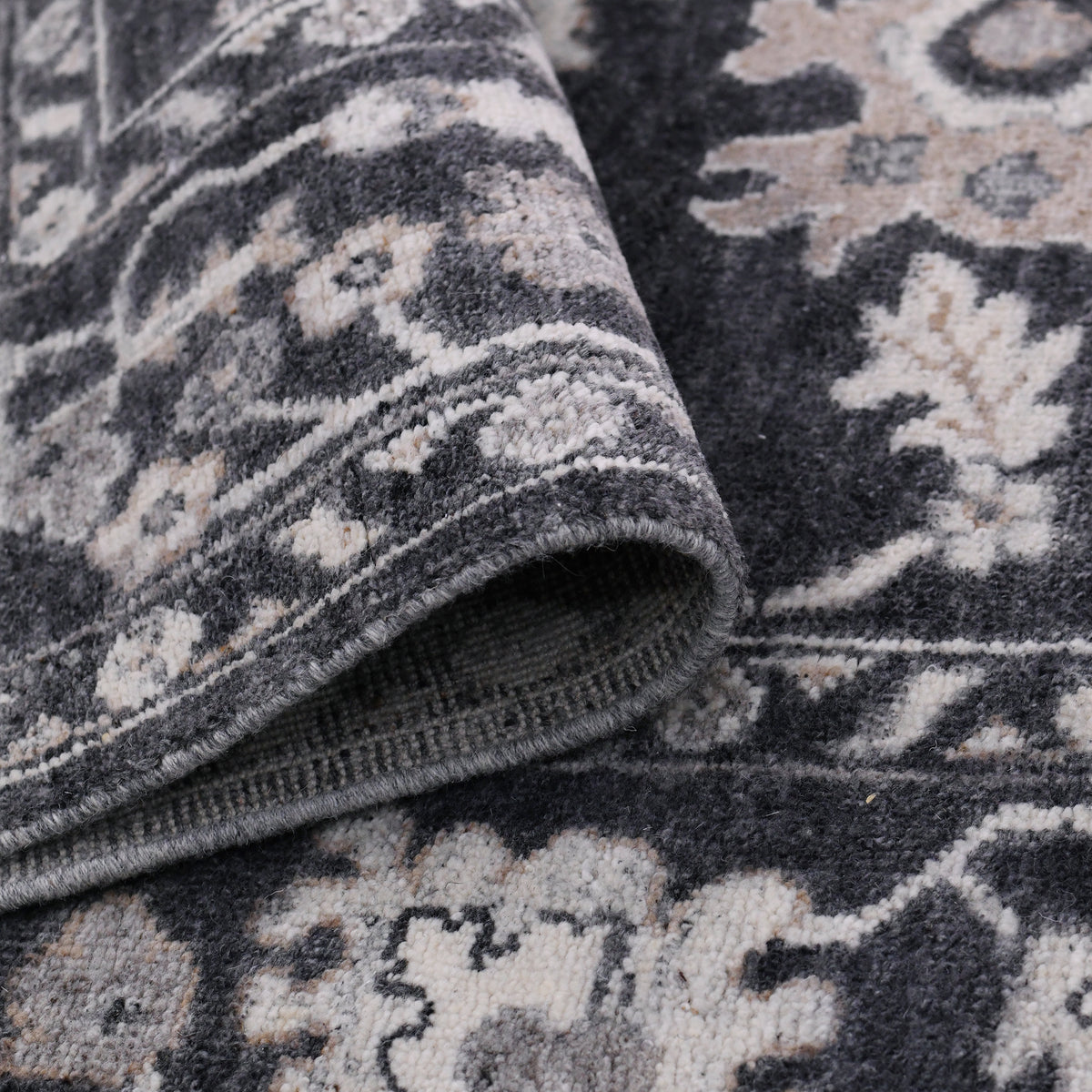 Amer Marlow 2026-03-06 00:00:00 Dark Gray area rug - rolled view