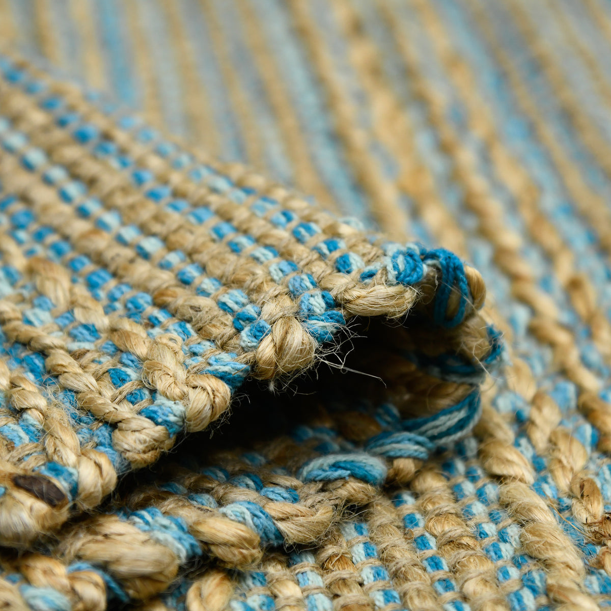Amer Naturals NAT-1 Blue area rug - rolled view