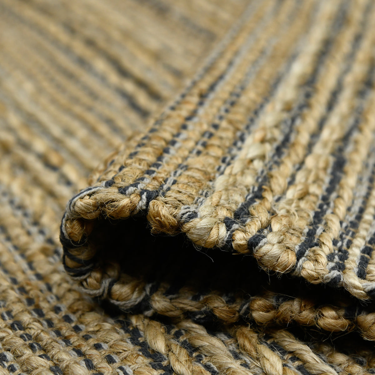 Amer Naturals NAT-6 Dark Gray area rug - rolled view