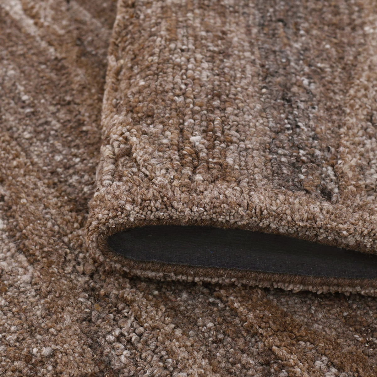 Amer Nimbus NIM-10 Tan Brown area rug - rolled view