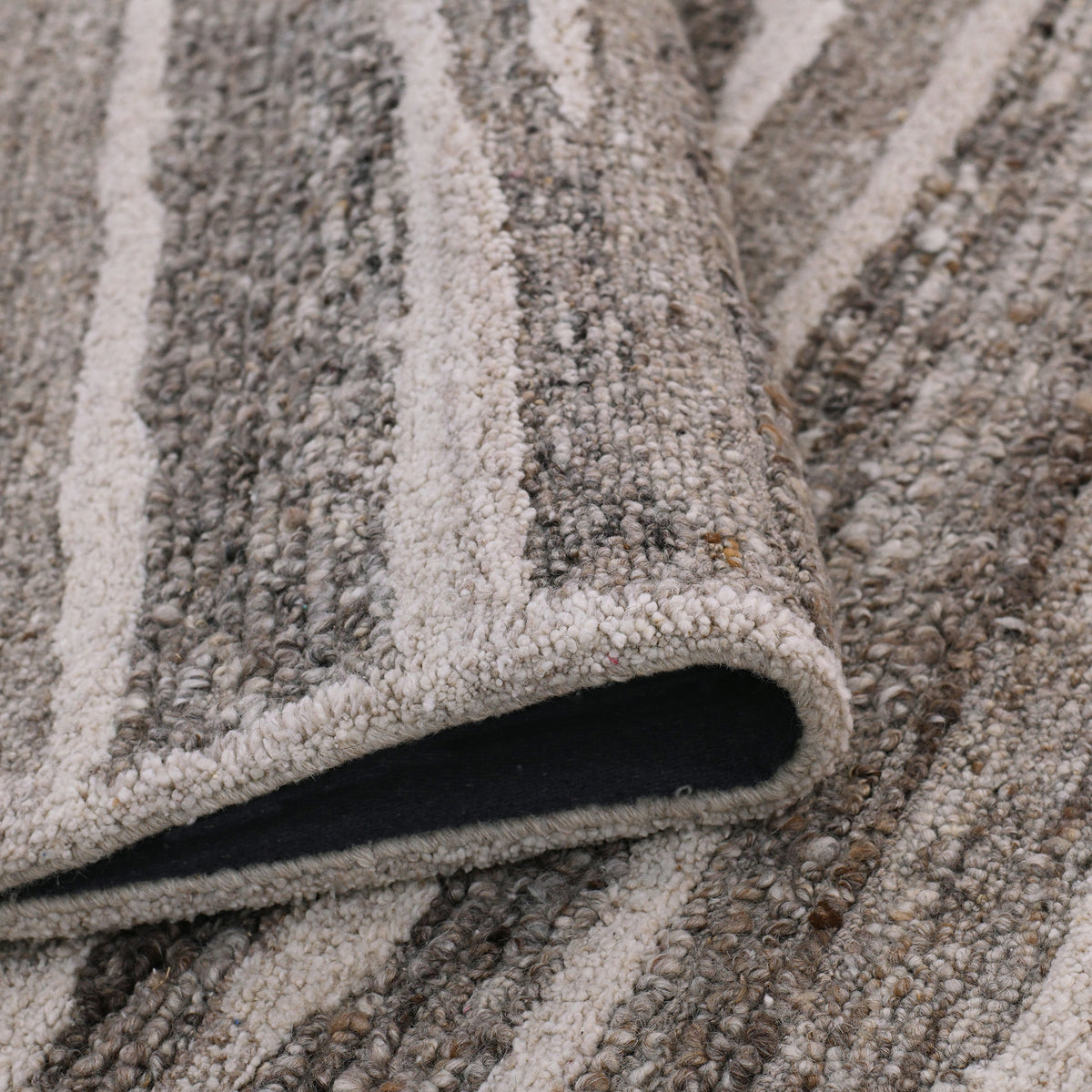 Amer Nimbus NIM-7 Beige Brown area rug - rolled view