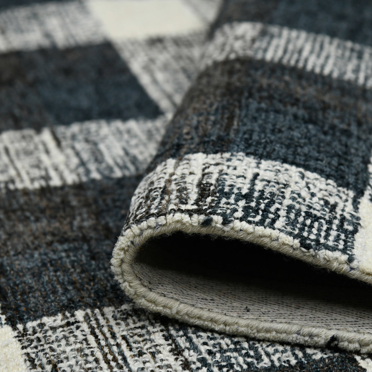 Amer Tartan TRA-6 Charcoal area rug - rolled view