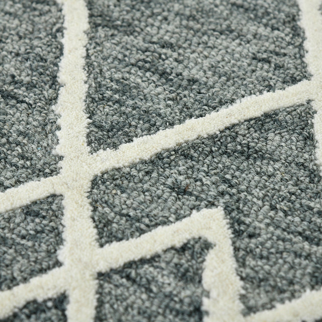 Dense close-up of gray geometric pattern with off-white intersecting lines