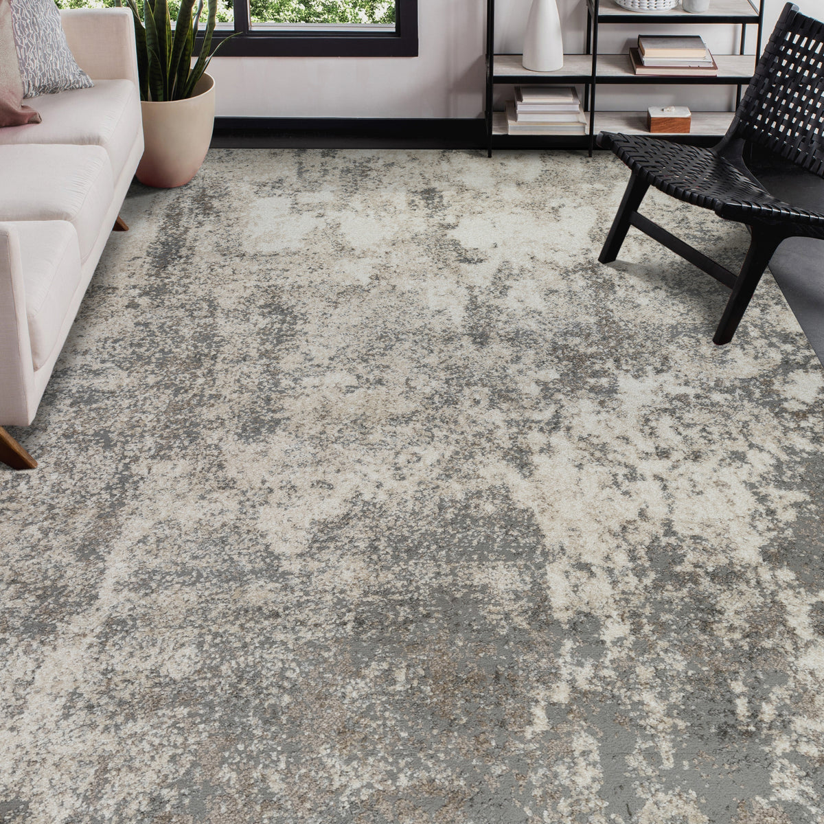Contemporary rectangular area rug with light gray and beige distressed pattern.