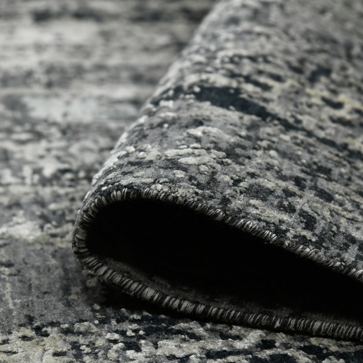 Amer Zenith ZEN-38 Dark Gray area rug - rolled view