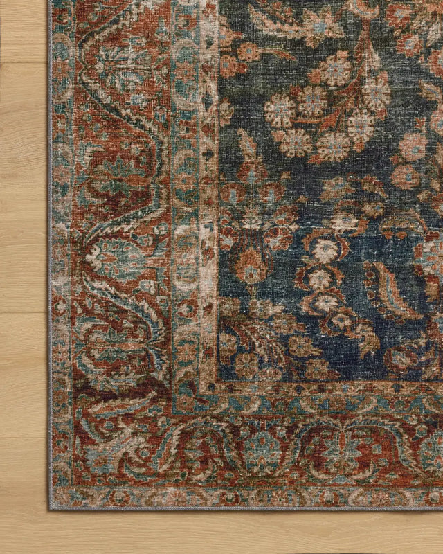 Chris Loves Julia x Loloi Jules 10-Jul Ocean / Spice Rug - corner on wood