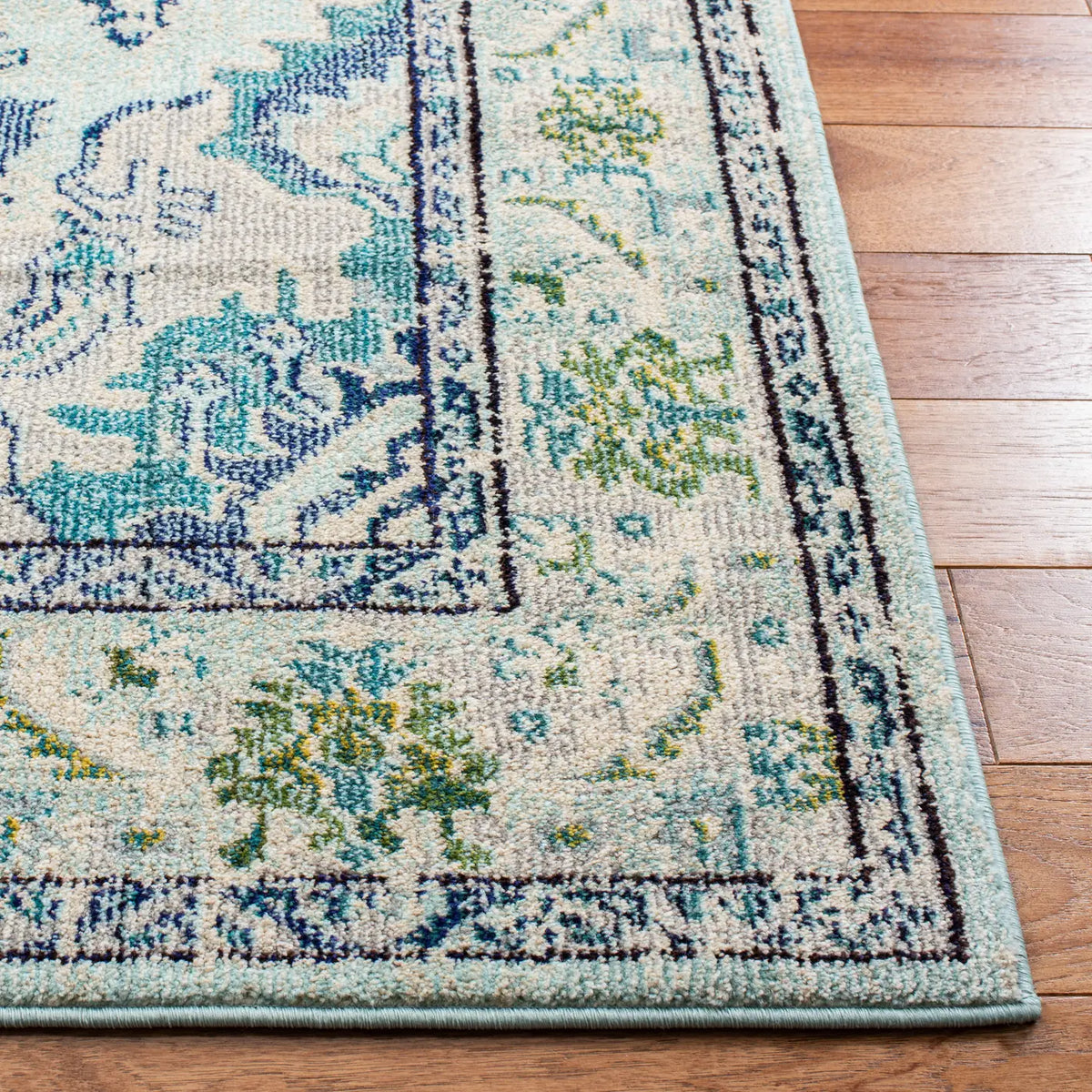 Safavieh Monaco 4'-0" x 5'-7" Rug in Light Blue / Ivory