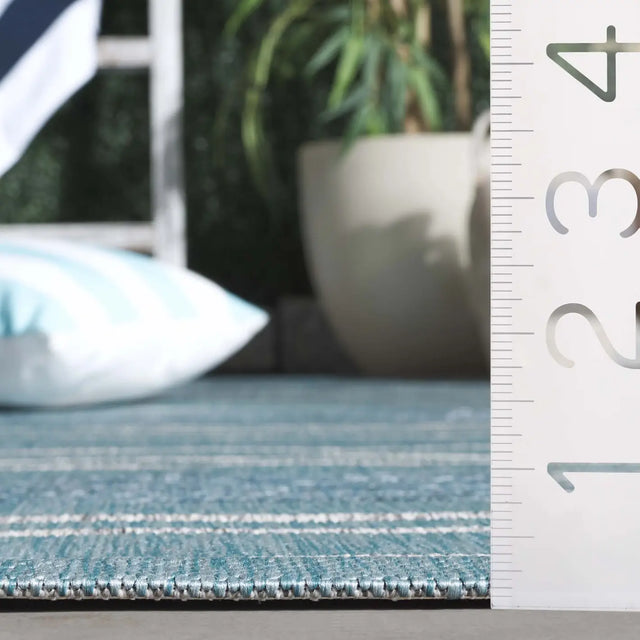 Safavieh Courtyard 5'-3" x 7'-7" Rug in Aqua / Grey