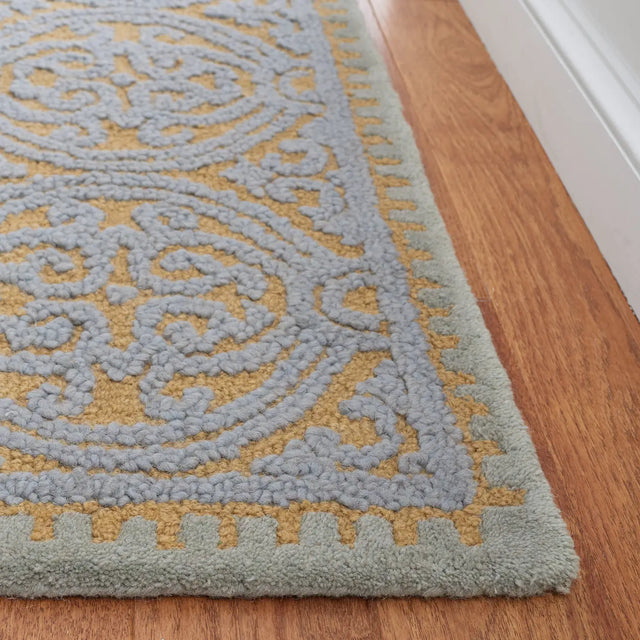 Safavieh Cambridge 4'-0" x 6'-0" Rug in Blue / Gold