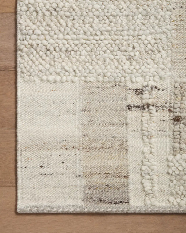 Loloi Manfred Man-01 Natural/Stone Rug - corner on wood