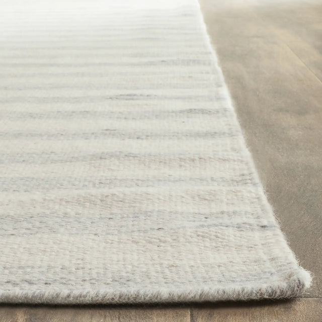Safavieh Dhurries 6'-0" x 9'-0" Rug in Light Blue / Ivory