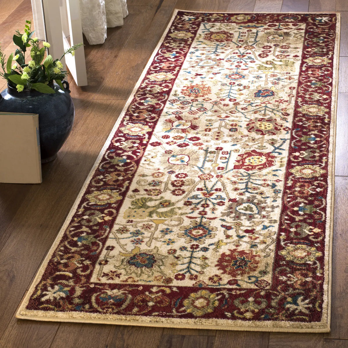 Safavieh Kashan 2'-6" x 10'-0" Rug in Ivory / Red