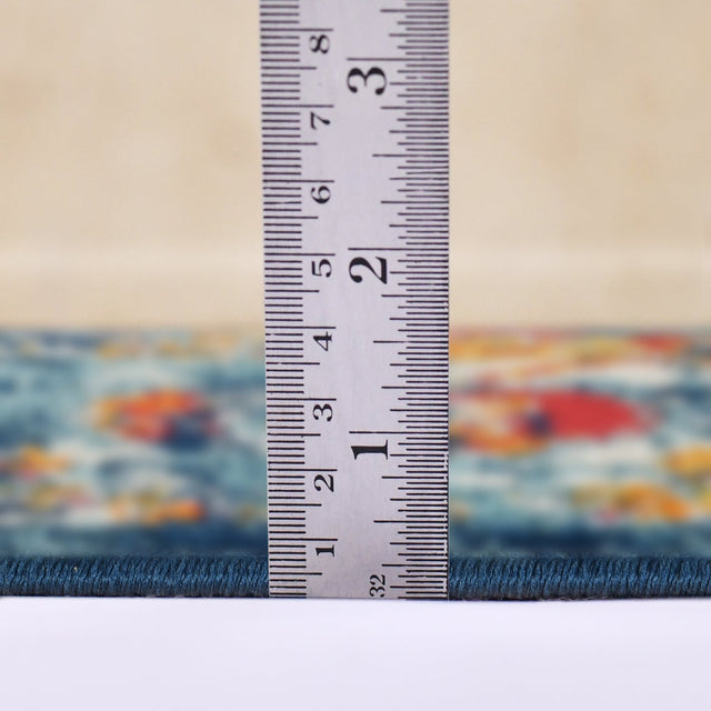 Navy area rug border with height measured, short pile edge detail