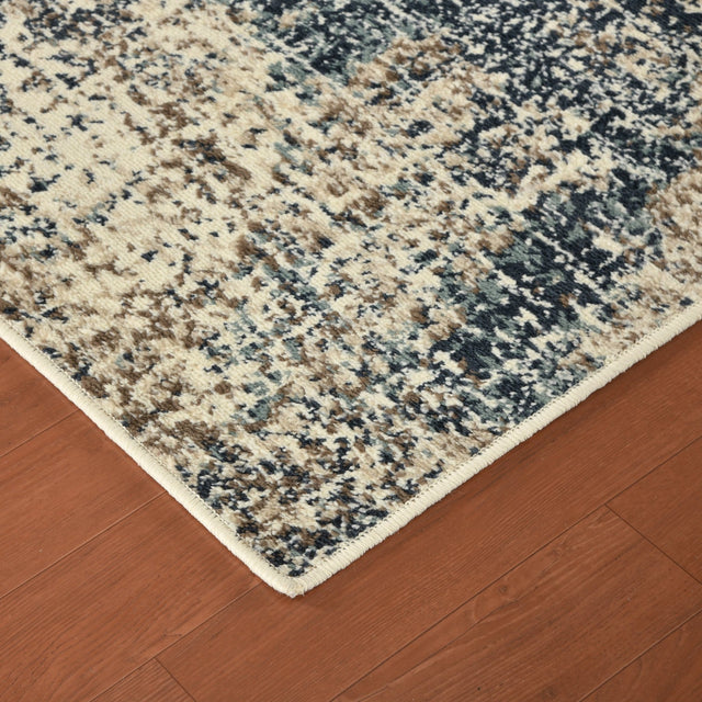 Rectangle area rug with blue-gray and cream speckled abstract design and border
