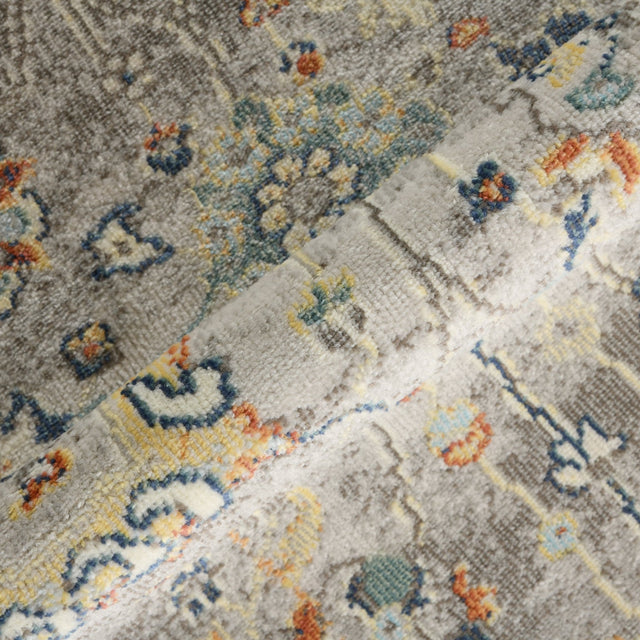 Gray bohemian floral rug pattern detail with small multicolor icons and lines